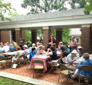 Sharing food and fellowship on a warm spring day after worship.